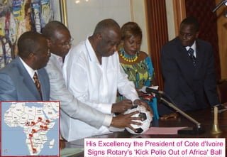His Excellency the President of Cote d'Ivoire Signs Rotary's 'Kick Polio Out of Africa' Ball 