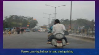 Person carrying helmet in hand during riding
 