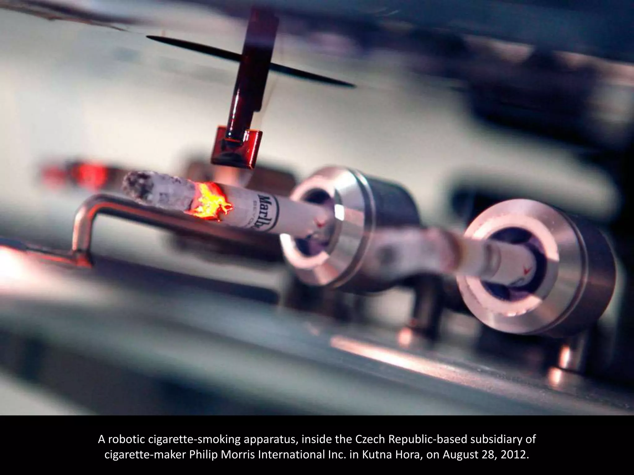 A robotic cigarette-smoking apparatus, inside the Czech Republic-based subsidiary of
 cigarette-maker Philip Morris International Inc. in Kutna Hora, on August 28, 2012.
 