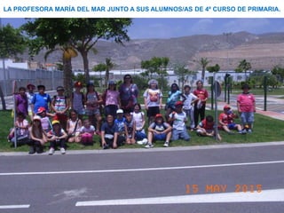 LA PROFESORA MARÍA DEL MAR JUNTO A SUS ALUMNOS/AS DE 4º CURSO DE PRIMARIA.
 