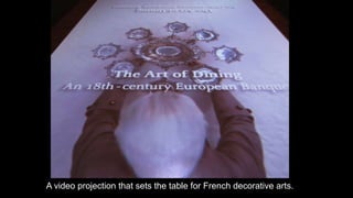 A video projection that sets the table for French decorative arts.
 