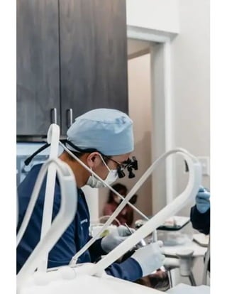 San Antonio dentist at work in the operatory at Life Smiles Dental Studio.pdf
