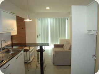  Área de serviço equipada com máquina de lavar e secadora de roupas;