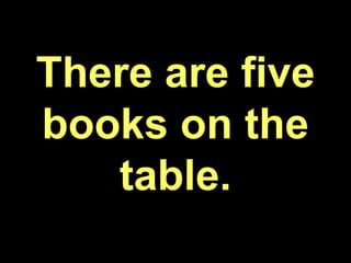 There are five
books on the
table.