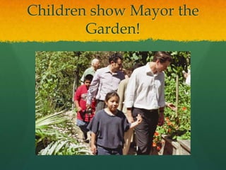 Children show Mayor the
        Garden!
 