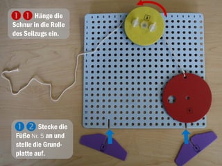 Hänge die
Schnur in die Rolle
des Seilzugs ein.

Stecke die
Füße Nr. 5 an und
stelle die Grund-
platte auf.

 