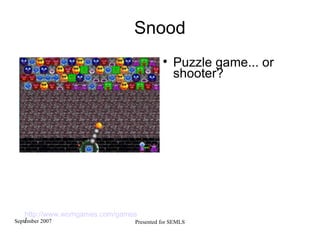 Snood Puzzle game... or shooter? http://www.womgames.com/games  / 