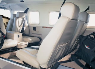 With the Seneca V, you don't have to choose between luxury, comfort, power, elegance, style, convenience, flexibility and
utility. You get it all. The cabin is beautifully appointed with lush, leather, improved comfort lounge seats for 6, refreshment
console with cup holders, fold-down armrests, built-in executive writing table, 28-volt accessory power point, coordinating
carpet, designer side panels, pleated window shades and more.

                                                                        But the Seneca V's creature comforts go far beyond the
                                                                      look and feel of this luxury cabin - the sound quality has
                                                                      been taken into account too. Thanks to specially designed
                                                                      propellers and extensive soundproofing, everyone enjoys a
                                                                      quiet and cozy flight.

                                                                        You and your passengers can bring along all the gear
                                                                      you'll need for a day, a weekend or a week. The Seneca V
                                                                      gives you the flexibility to configure the passenger, baggage
                                                                      and fuel load to meet your demands. Open the rear main
                                                                      and cargo doors, remove the quick-release rear seats, and
                                                                      you've got a spacious, open and easy access cargo area.
                                                                      Plus there's another 15.3 cubic feet of baggage space in
                                                                      the nose!

                                                                      Grab your gear and settle in. You're in for a special trip!
 