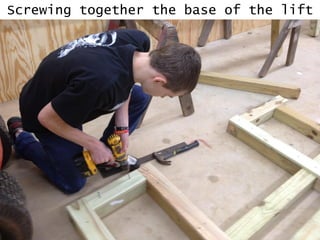 Screwing together the base of the lift
 