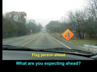What are you expecting ahead?
Flag person ahead
 