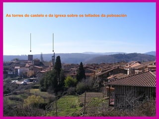 As torres do castelo e da igrexa sobre os tellados da poboación 