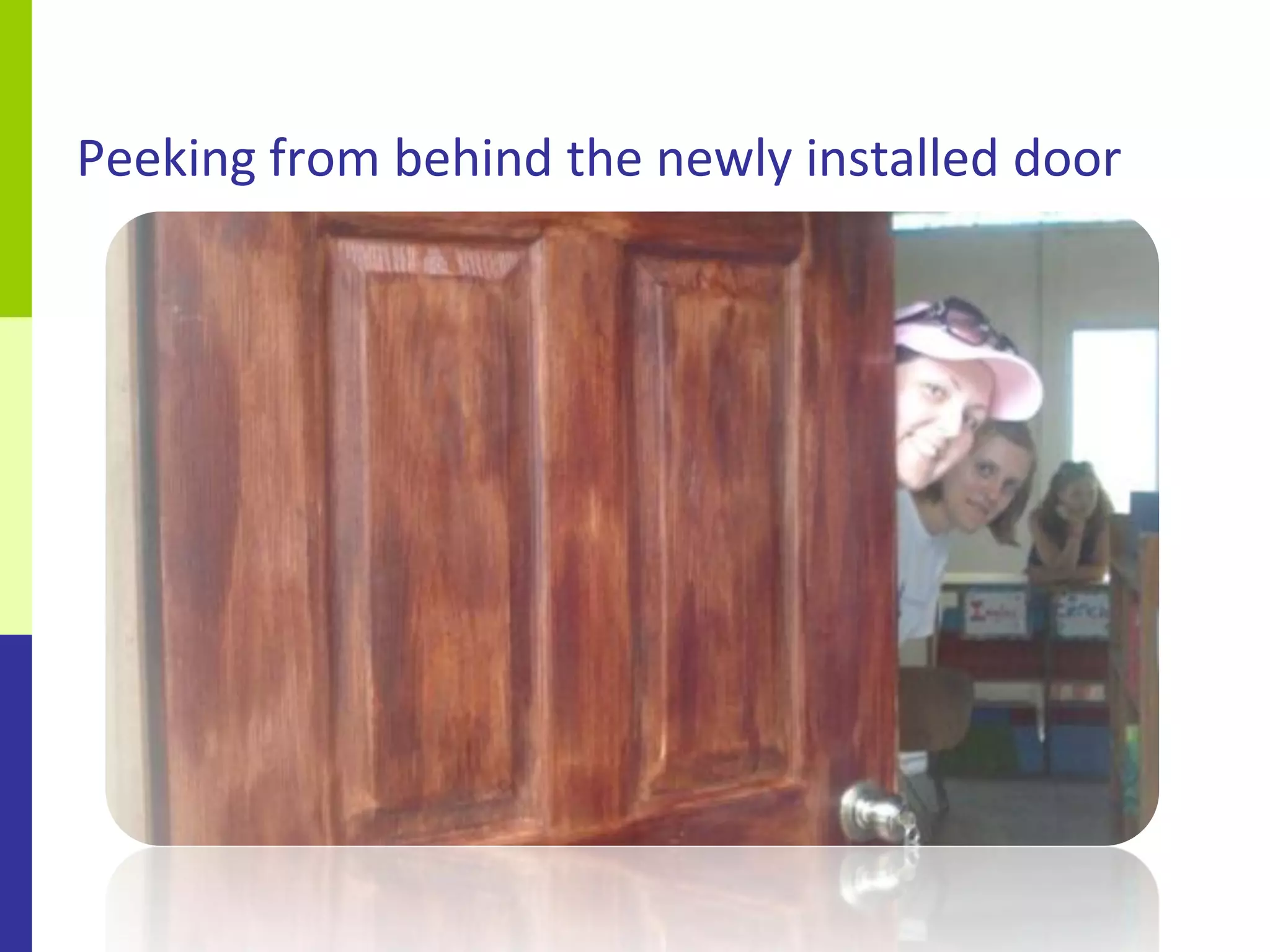 Peeking from behind the newly installed door
 