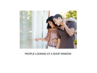 PEOPLE LOOKING AT A SHOP WINDOW
 
