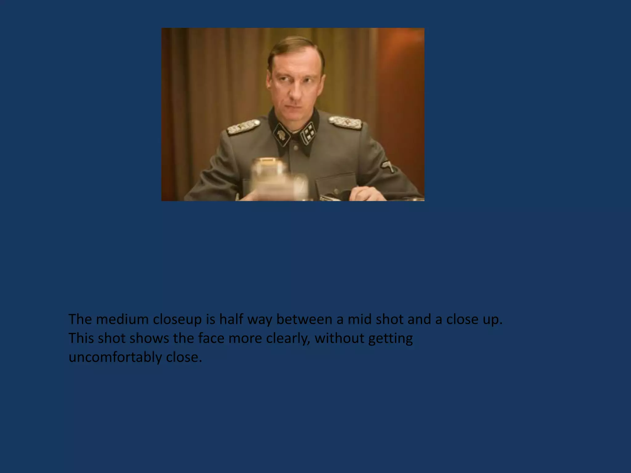 The medium closeup is half way between a mid shot and a close up.
This shot shows the face more clearly, without getting
uncomfortably close.
 