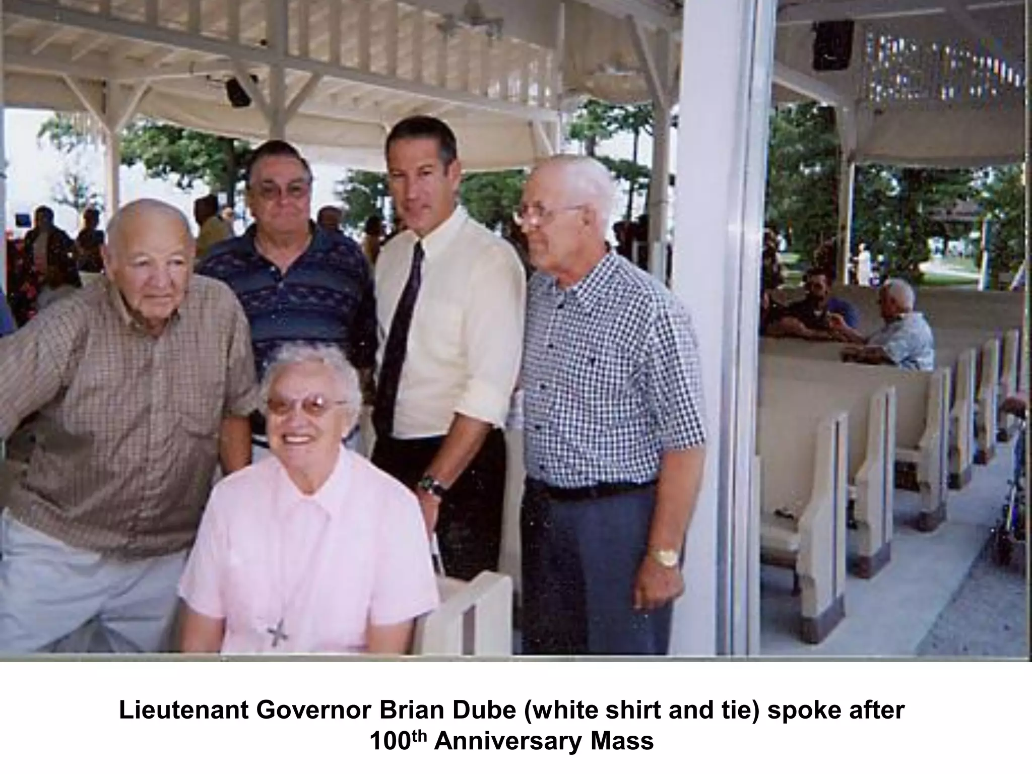 Lieutenant Governor Brian Dube (white shirt and tie) spoke after
                   100th Anniversary Mass
 