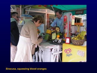 Siracusa, squeezing blood oranges 