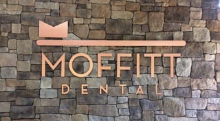 Signage on the wall at Moffitt Dental Center