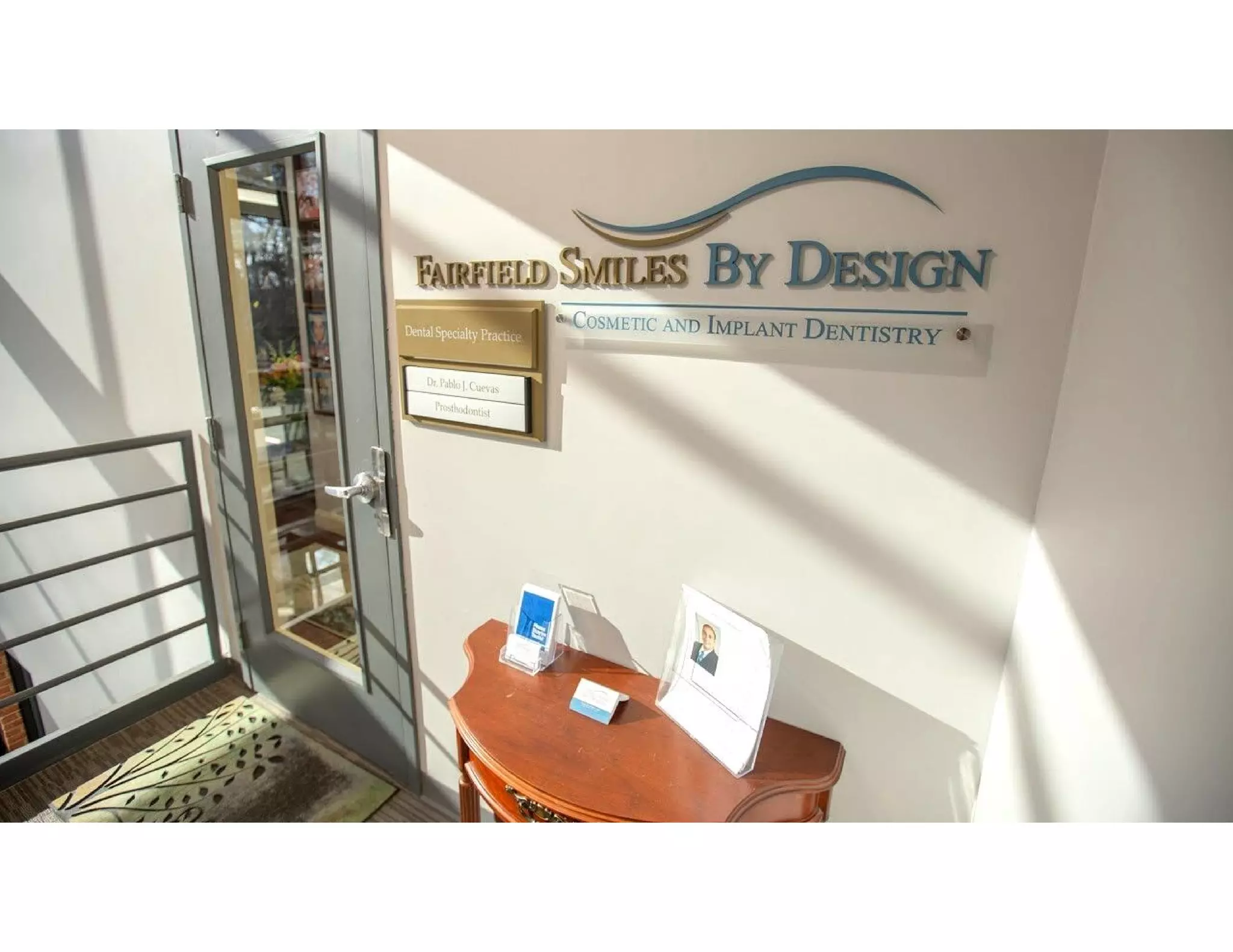 Signage at the entrance door at Fairfield Smiles by Design | PDF