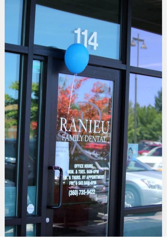 Signage On Glass Door At Ranieu Family Dental