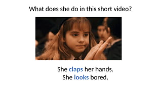 What does she do in this short video?
She claps her hands.
She looks bored.
 