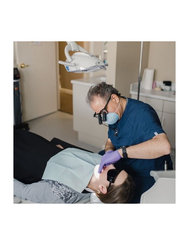 Sioux Falls dentist Dr. Kusek performing root canal procedure at Kusek