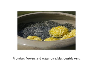 Promises flowers and water on tables outside tent. 