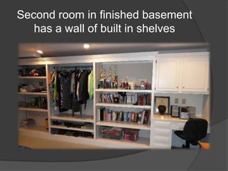 Second room in finished basement has a wall of built in shelves