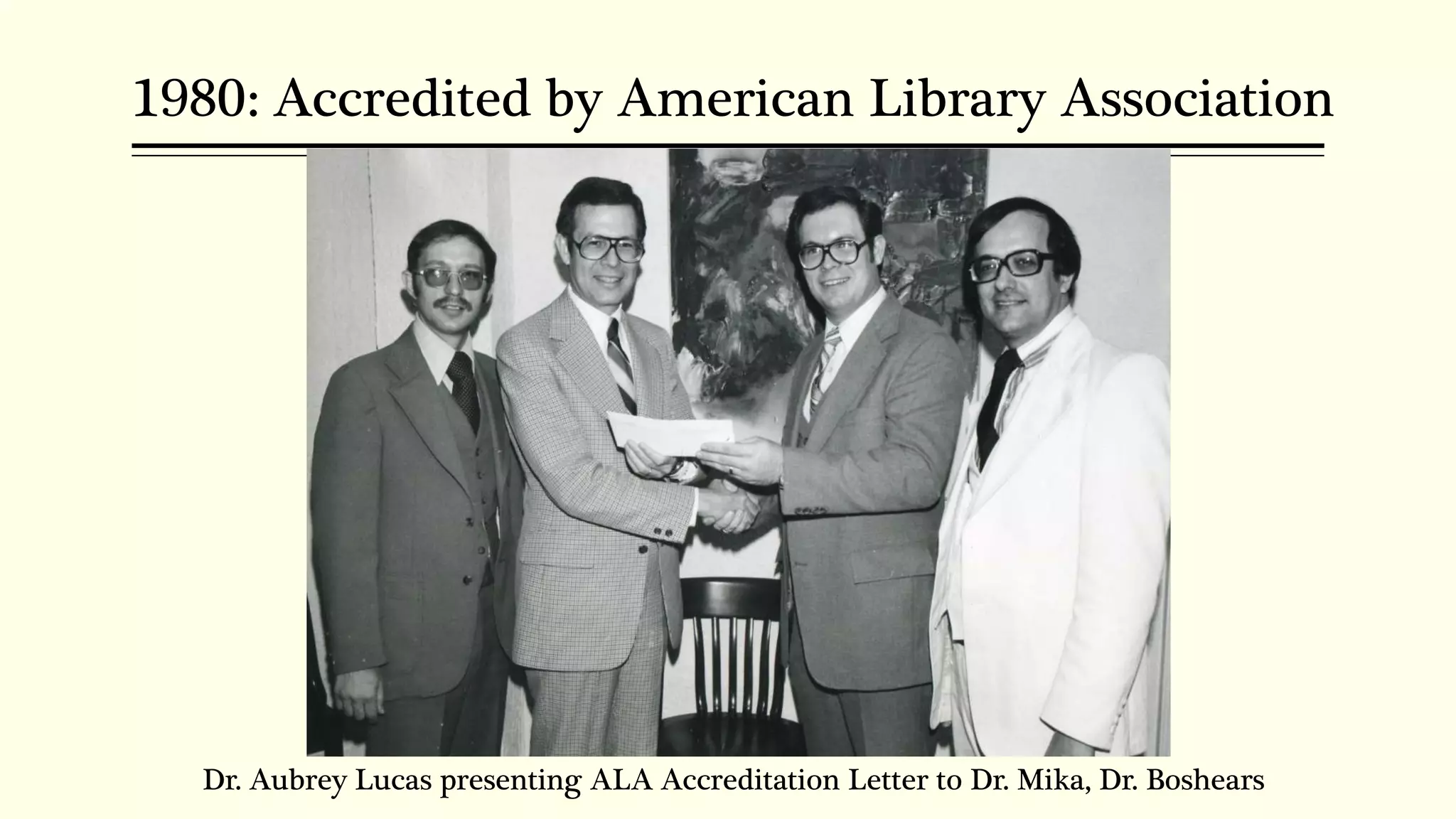 1980: Accredited by American Library Association
Dr. Aubrey Lucas presenting ALA Accreditation Letter to Dr. Mika, Dr. Boshears
 