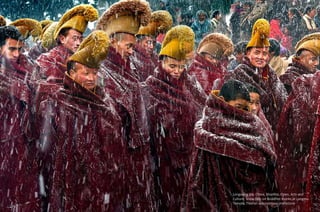 Longxiang Xie, China, Shortlist, Open, Arts and
Culture. Snow falls on Buddhist monks at Langmu
Temple, Tibetan autonomous prefecture
 