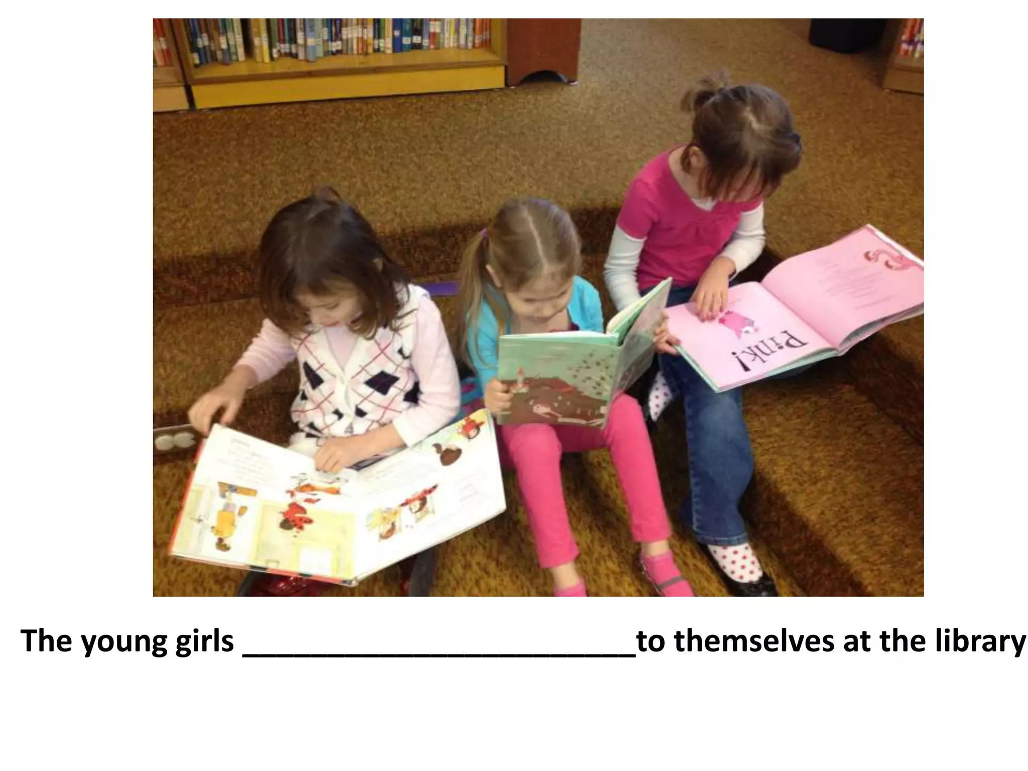 The young girls _______________________to themselves at the library
 