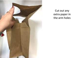 Cut out any
extra paper in
the arm holes
 