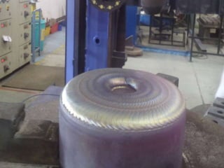 Hardfacing on buffered specimen:
 