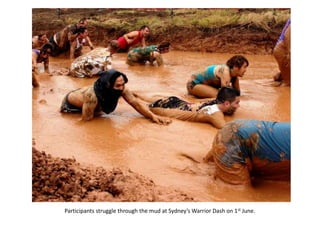 Participants struggle through the mud at Sydney’s Warrior Dash on 1st June.
 