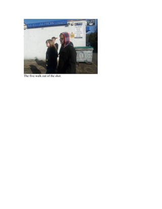 The five walk out of the shot.
 