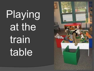 Playing at the train table