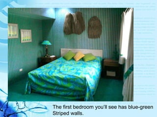 The first bedroom you’ll see has blue-green Striped walls. 