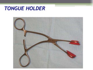 TONGUE HOLDER
 
