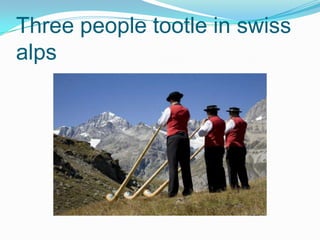 Three people tootle in swiss
alps
 