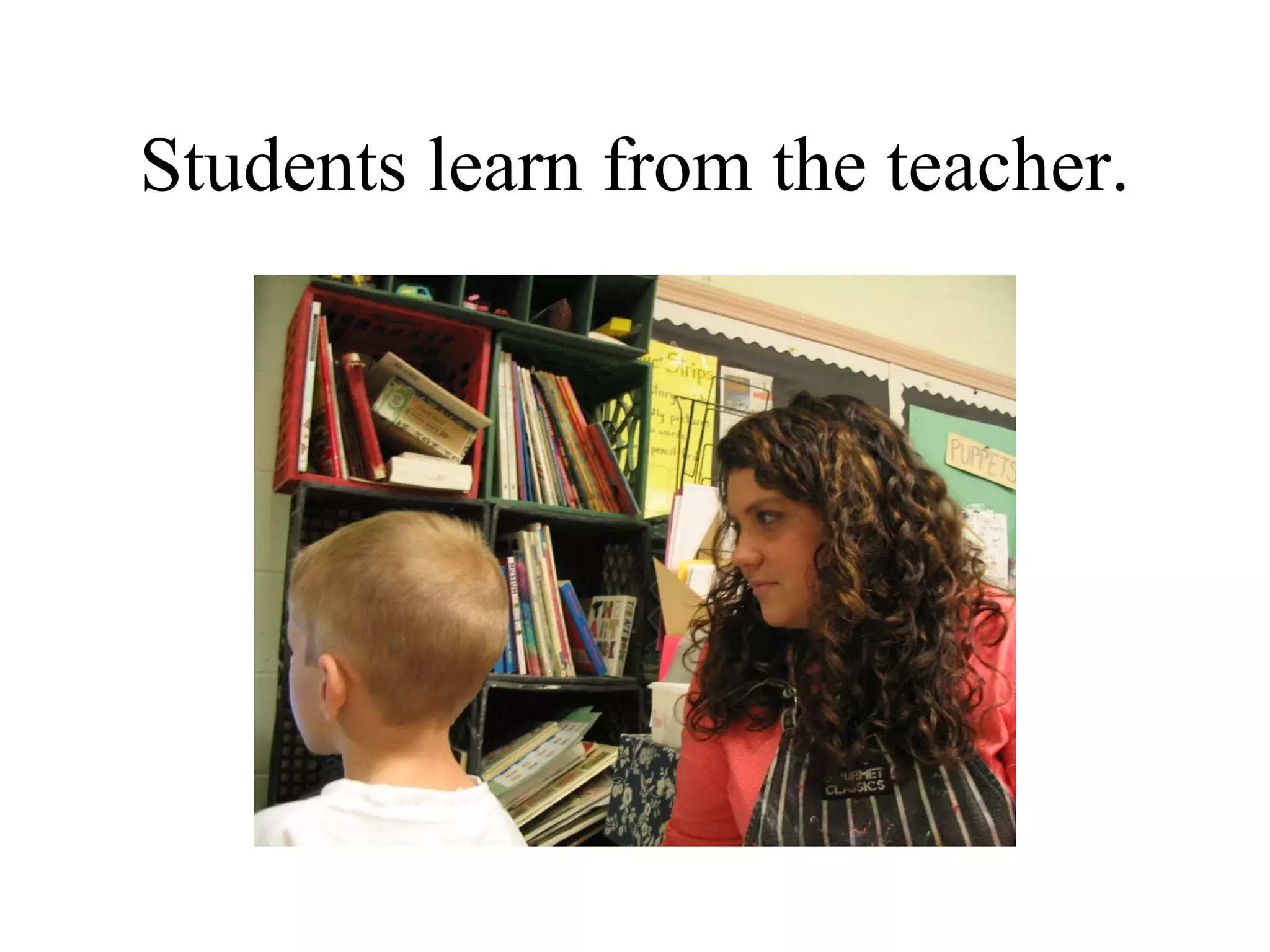 Students learn from the teacher. 