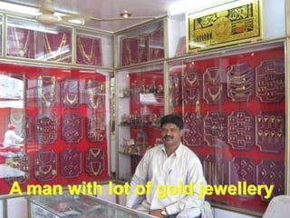 A man with lot of gold jewellery
 