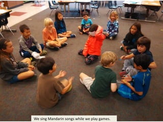 We sing Mandarin songs while we play games.
 