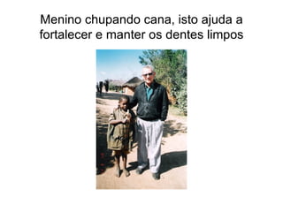 Menino chupando cana, isto ajuda a fortalecer e manter os dentes limpos 