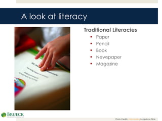 A look at literacy Traditional Literacies Paper Pencil Book Newspaper Magazine Photo Credits:  child reading  by apdk on Flickr.  