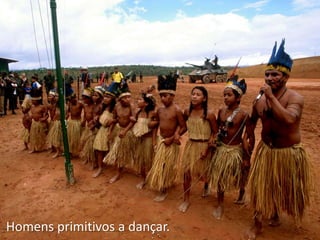 Homens primitivos a dançar.
 