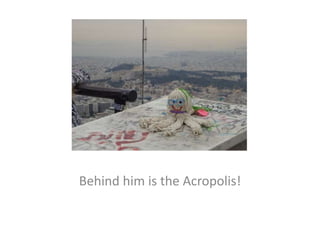 Behind him is the Acropolis!
 