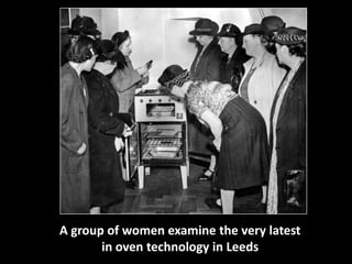 A group of women examine the very latest 
in oven technology in Leeds 
 
