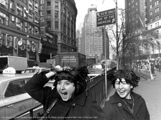 Two fans try out their Beatles wigs in anticipation of the British group's arrival in New York, 6 February 1964

 