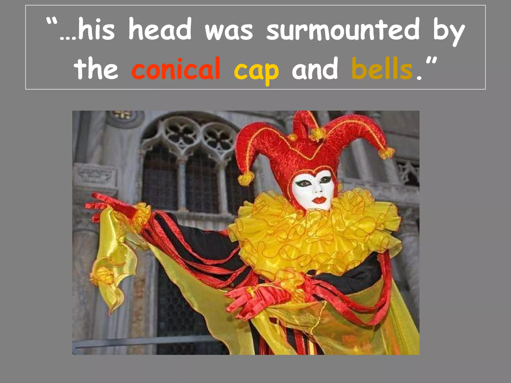 “… his head was surmounted by the conical cap and bells .”