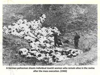 A German policeman shoots individual Jewish women who remain alive in the ravine after the mass execution. (1942)   