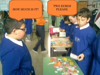 HOW MUCH IS IT? TWO EUROS PLEASE. 